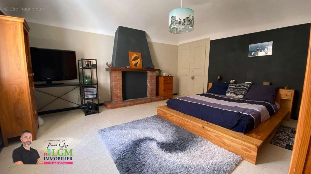 Maison à SAINT-JULIEN-LES-ROSIERS