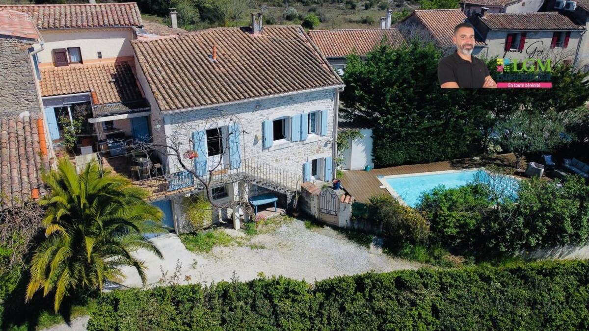 Maison à SAINT-JULIEN-LES-ROSIERS