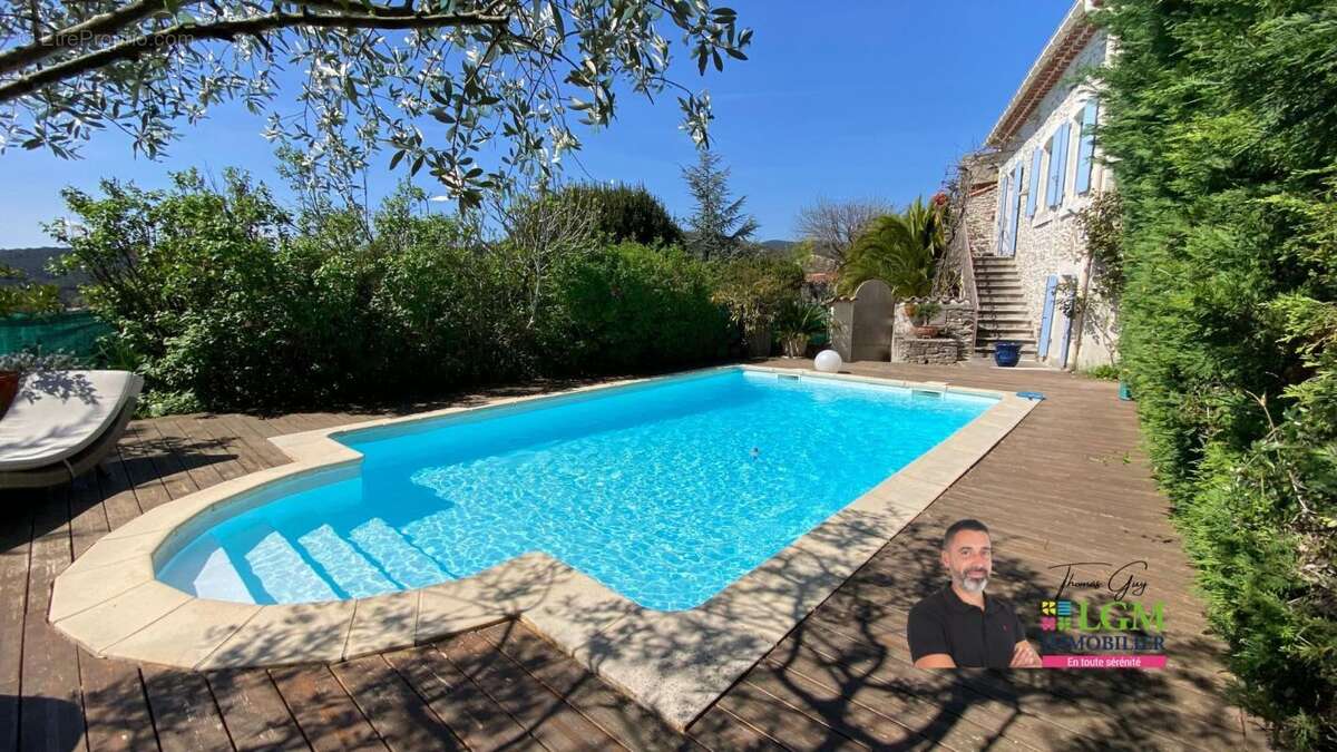 Maison à SAINT-JULIEN-LES-ROSIERS