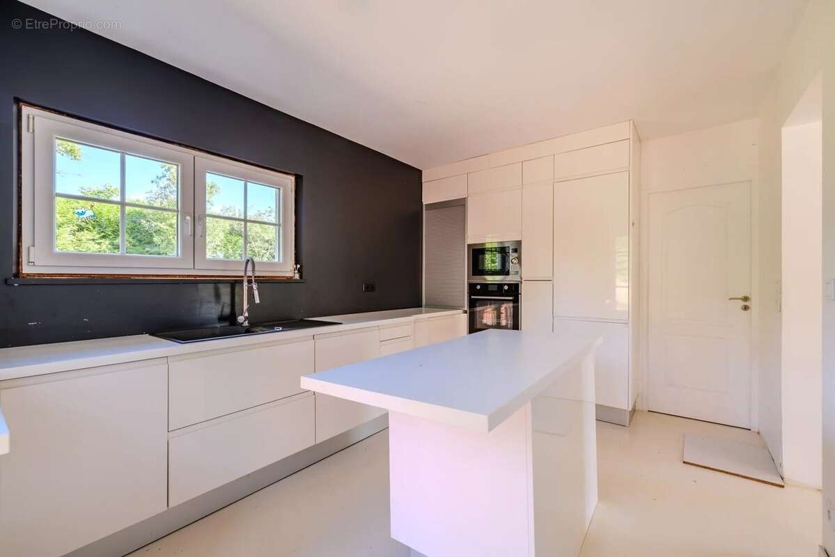 Maison à AUBERGENVILLE