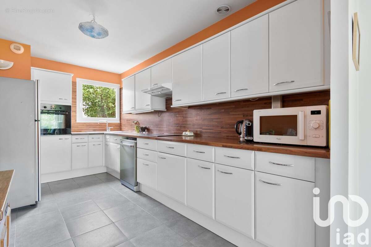 Photo 2 - Maison à VOISINS-LE-BRETONNEUX