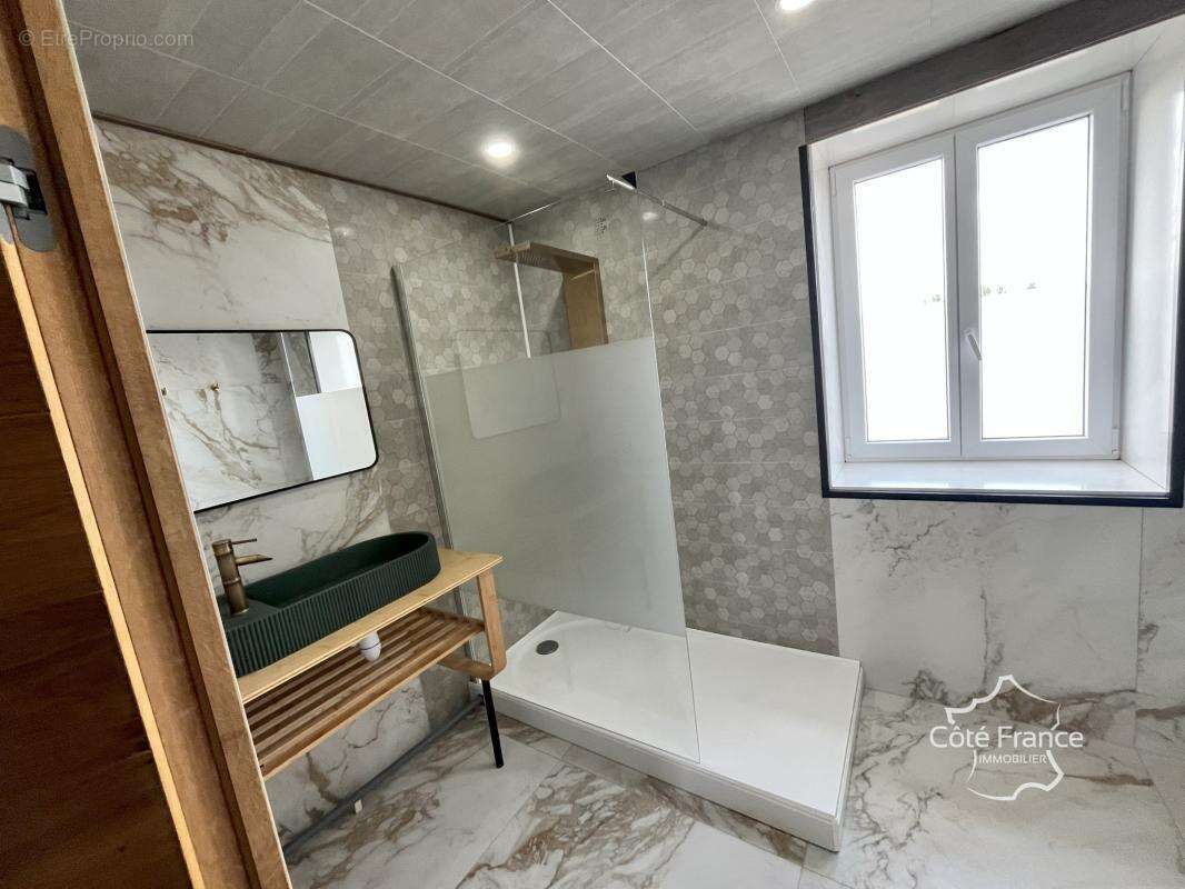 Maison à COSQUEVILLE