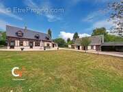 Maison à SAINT-OUEN-DE-THOUBERVILLE