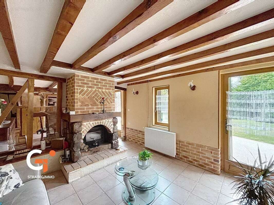 Maison à SAINT-OUEN-DE-THOUBERVILLE