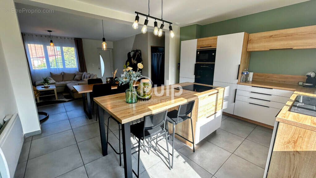 Maison à COURRIERES