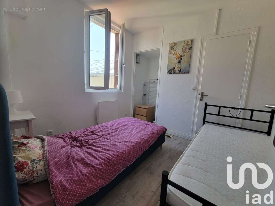 Photo 4 - Appartement à SAINT-ETIENNE-DU-ROUVRAY