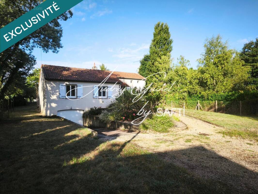 Photo 1 - Maison à BIGNOUX