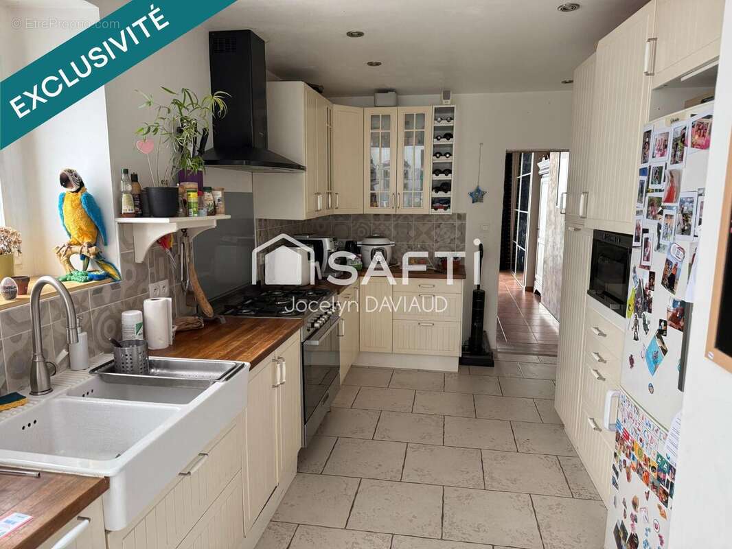 Photo 2 - Maison à BECON-LES-GRANITS