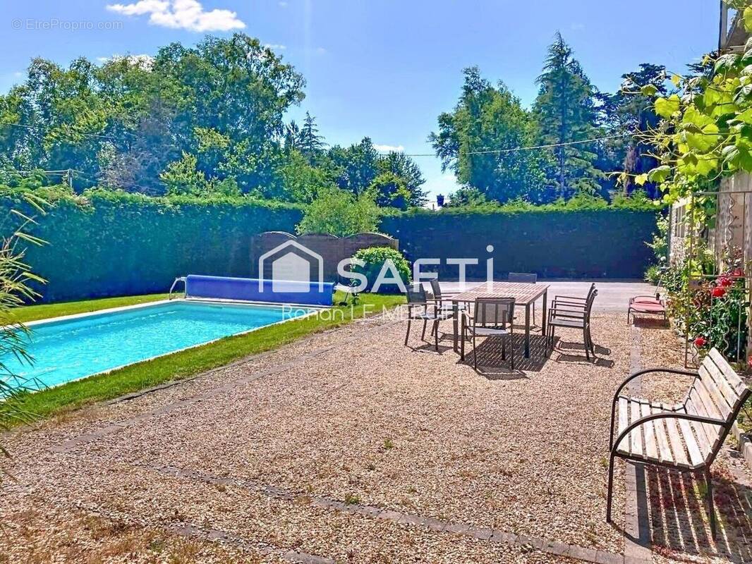 Photo 1 - Maison à LOCMARIA-GRAND-CHAMP