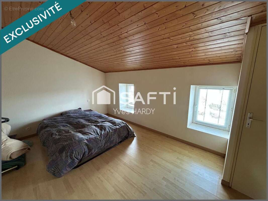 Photo 6 - Maison à LES LANDES-GENUSSON