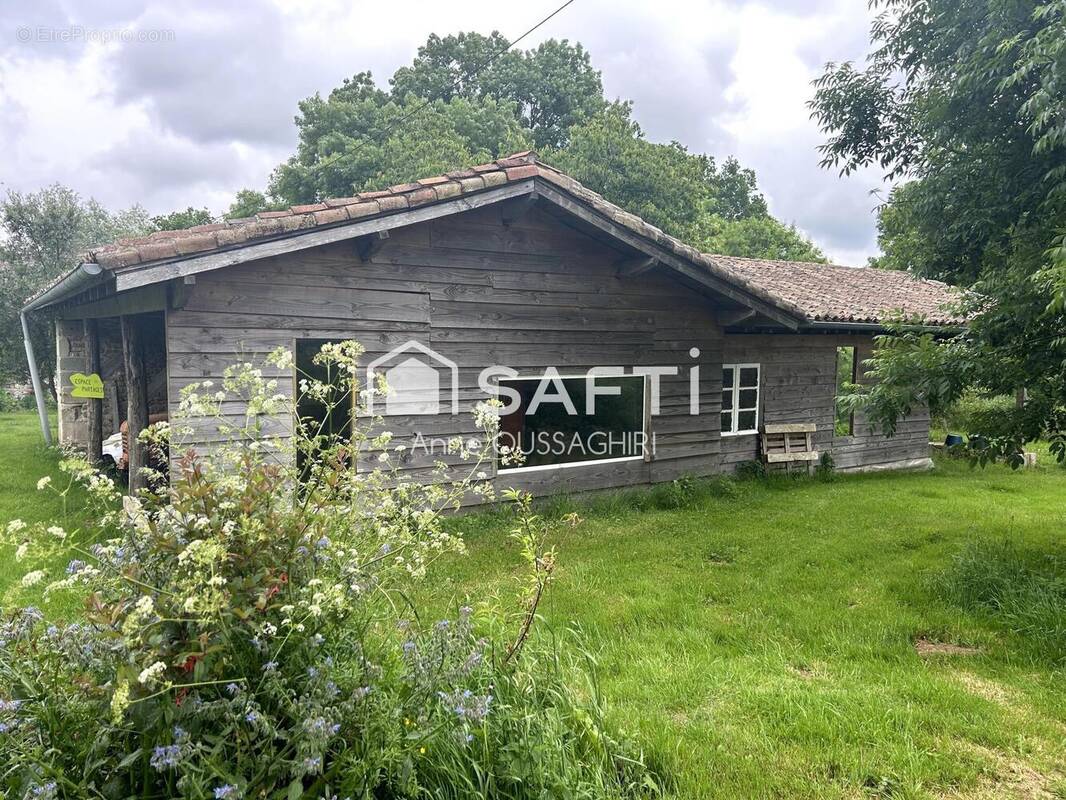 Photo 1 - Terrain à EXIREUIL