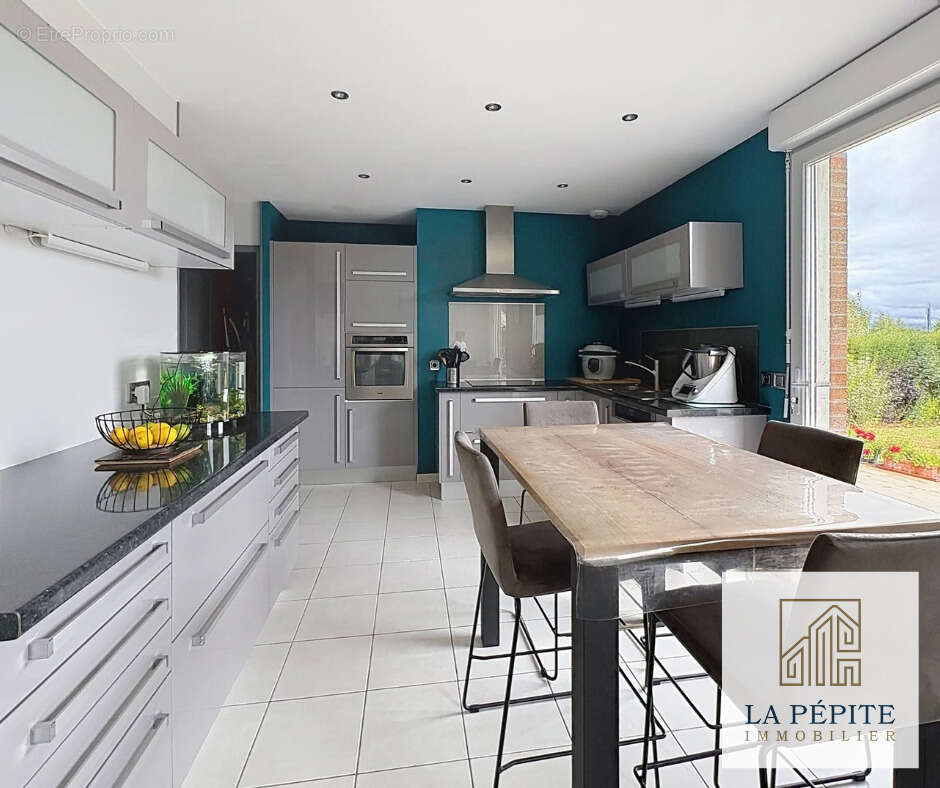 Maison à AULNOYE-AYMERIES