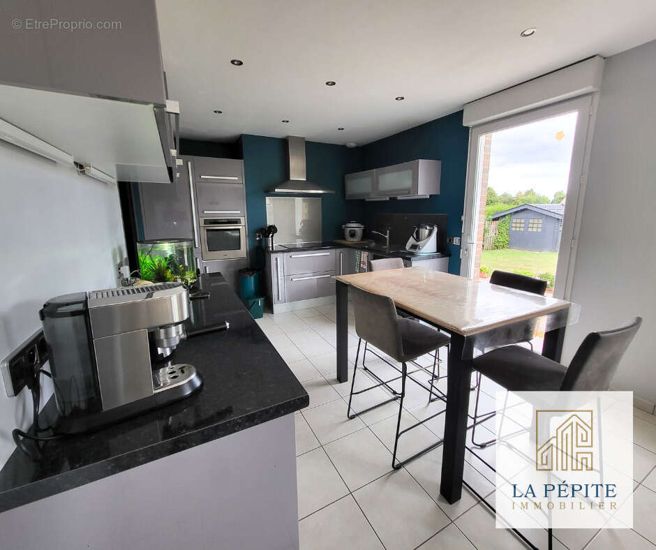 Maison à AULNOYE-AYMERIES