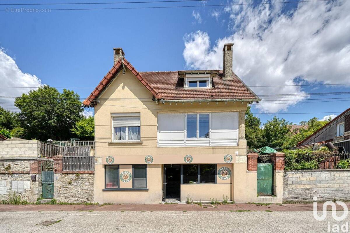 Photo 1 - Commerce à JUZIERS