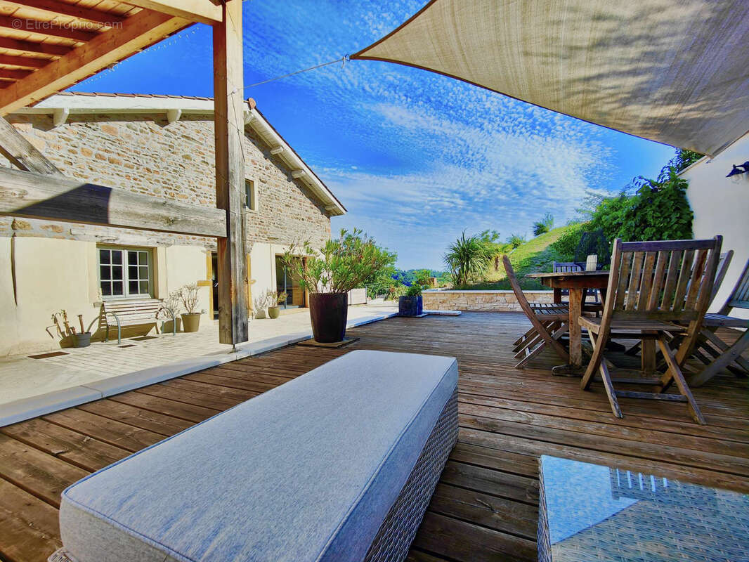 Maison à SOURCIEUX-LES-MINES