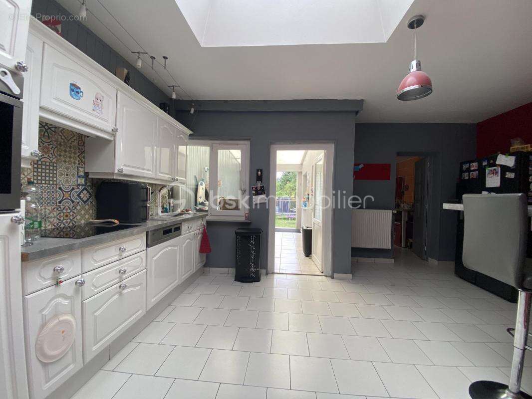 Maison à AUBERCHICOURT