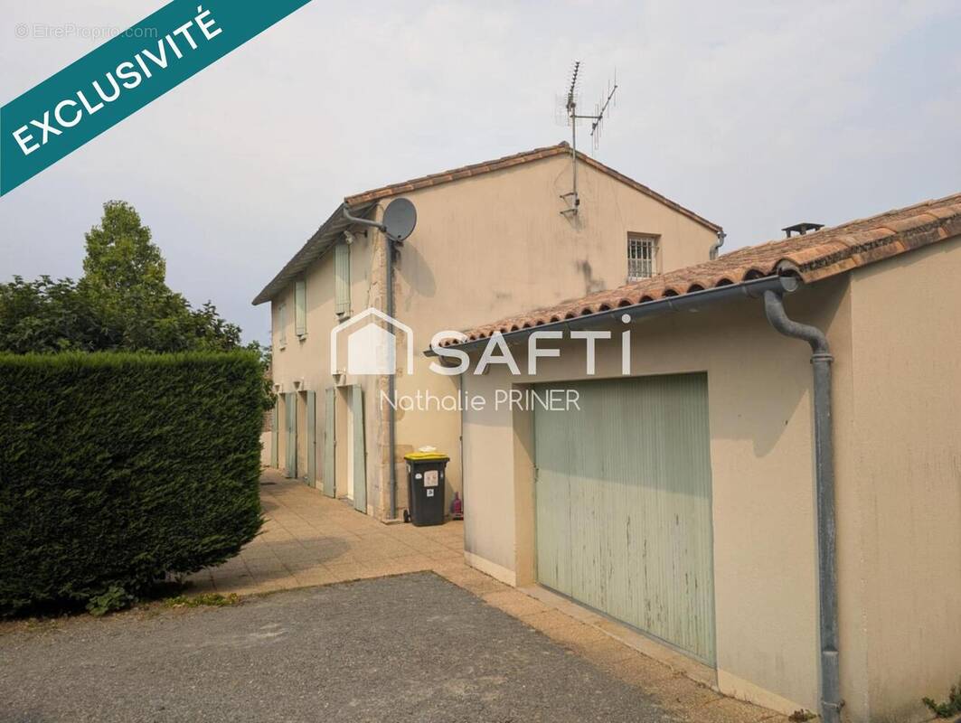 Photo 1 - Maison à VOUILLE