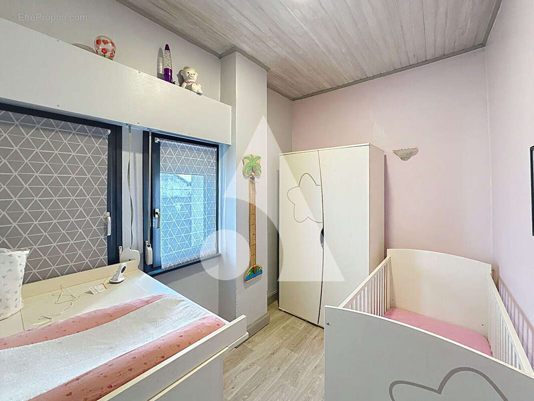 Maison à QUIEVRECHAIN