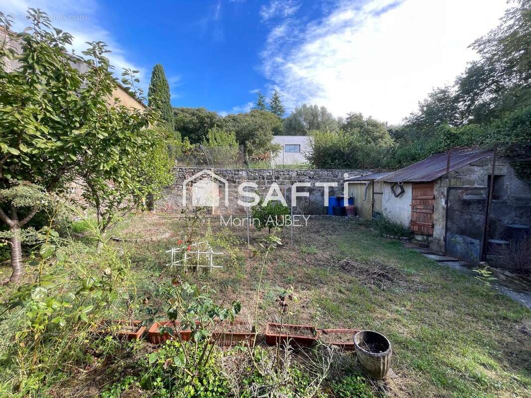 Photo 3 - Maison à SAINT-QUENTIN-LA-POTERIE