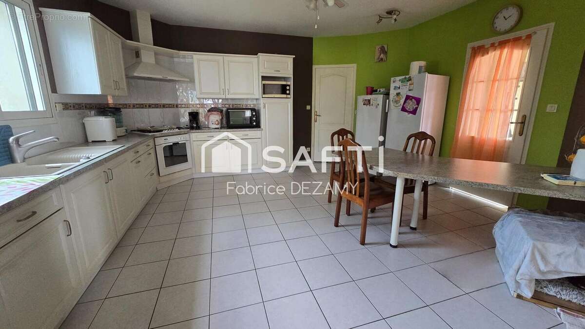 Photo 2 - Maison à CHATEAU-GUIBERT