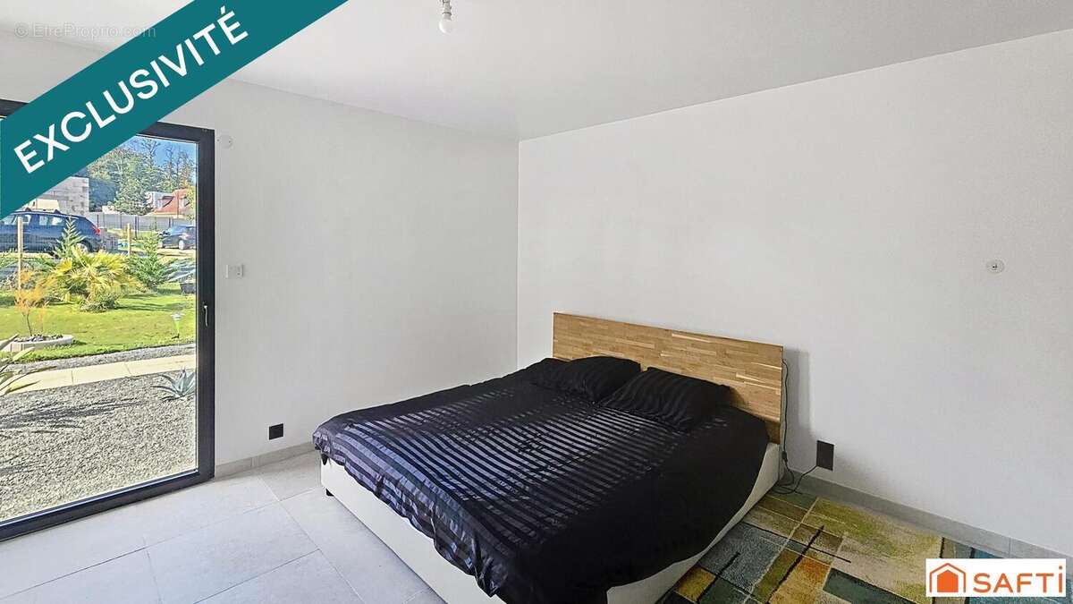 Photo 9 - Maison à SAINT-PIERRE-LA-GARENNE