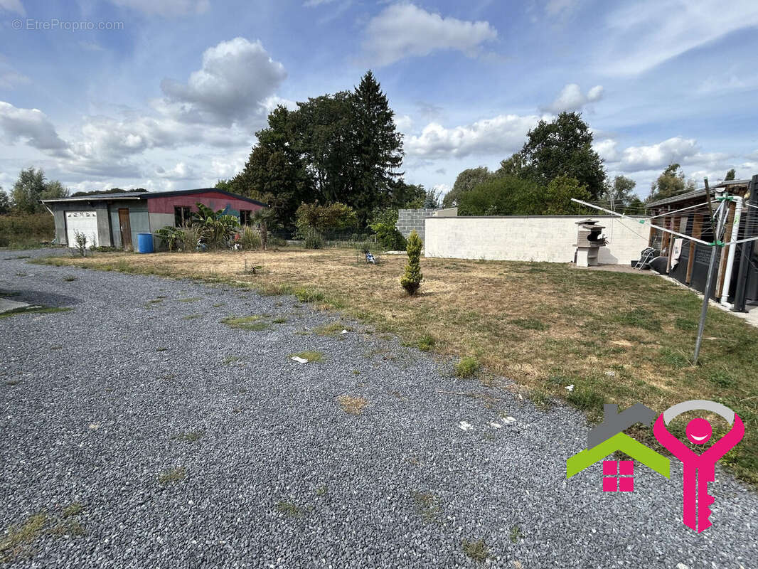 Maison à DOUCHY-LES-MINES