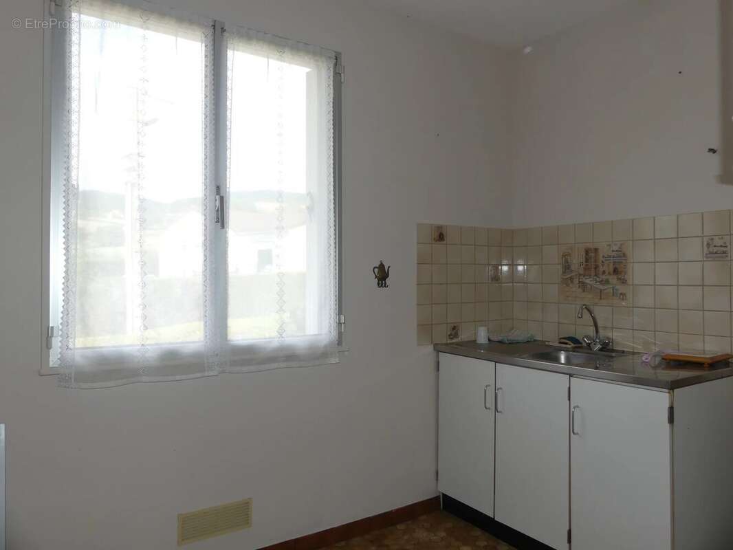 Maison à SAINT-SYMPHORIEN-DE-MARMAGNE