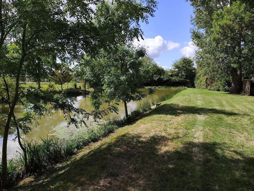 Photo 3 - Terrain à SAINT-GENOU