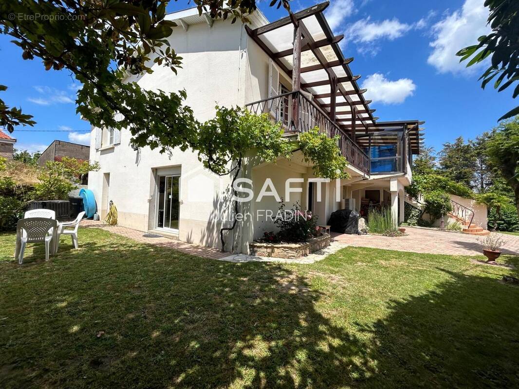 Photo 1 - Maison à SAINT-JULIEN-DE-CONCELLES