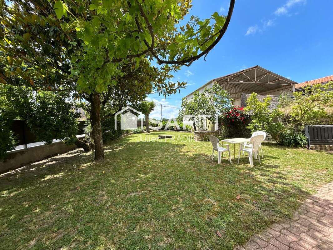 Photo 2 - Maison à SAINT-JULIEN-DE-CONCELLES