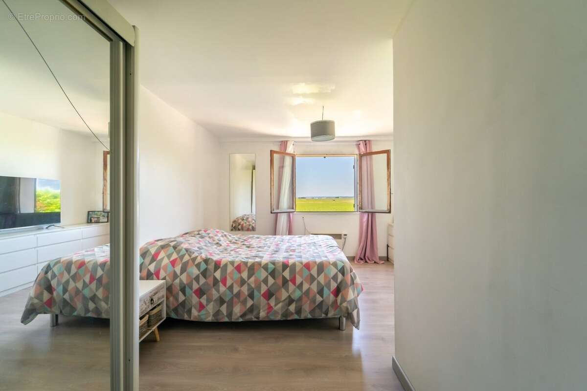 Chambre 15.39 m2 - Appartement à TRILBARDOU